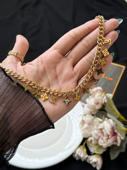 Heavy lv charm necklace