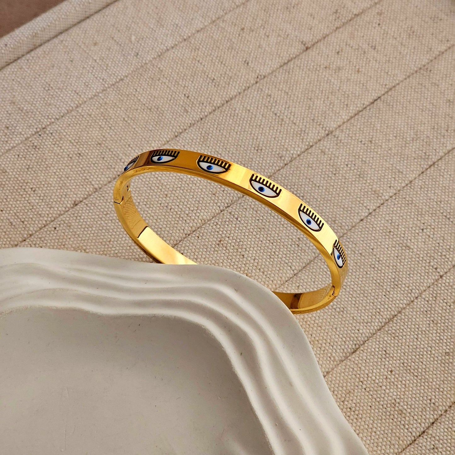 Stainless steel evil eye handcuff