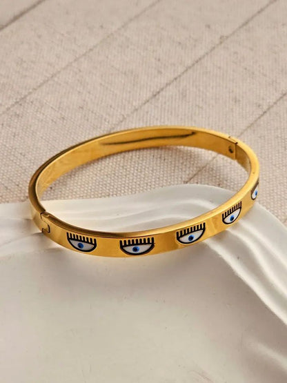 Stainless steel evil eye handcuff